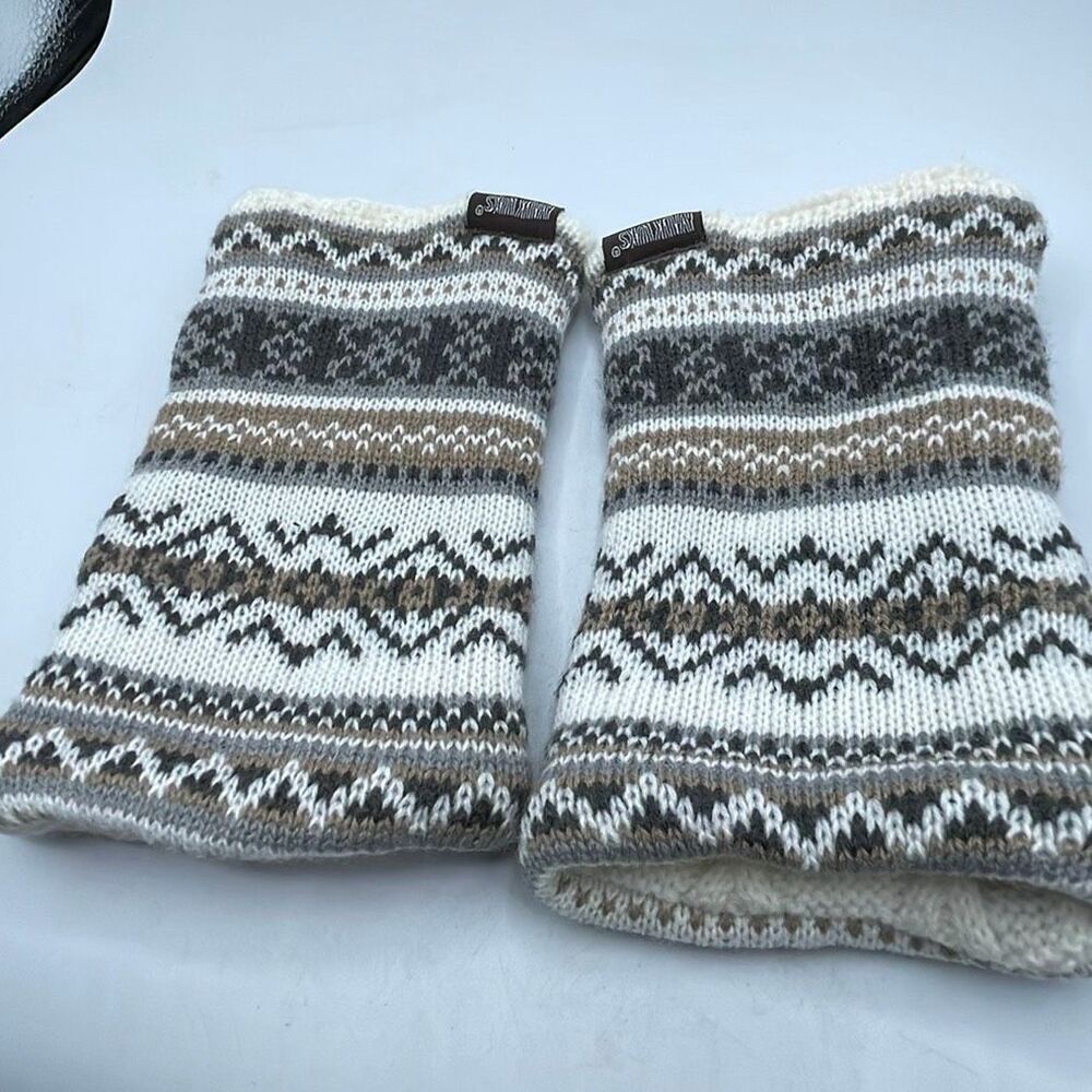 Muk Luks brand fingerless reversible gloves.